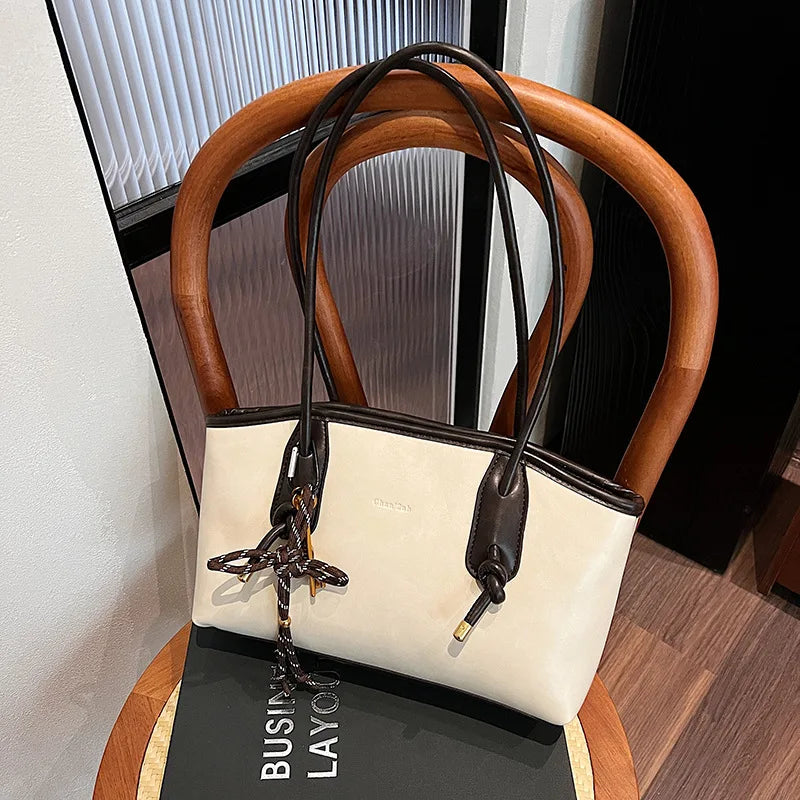 Bolsa Transversal Feminina em Couro Sintético