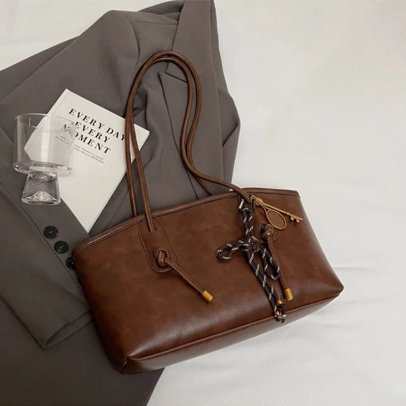 Bolsa Transversal Feminina em Couro Sintético