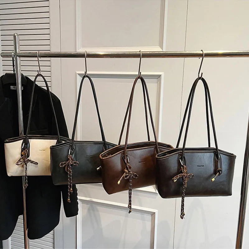 Bolsa Transversal Feminina em Couro Sintético