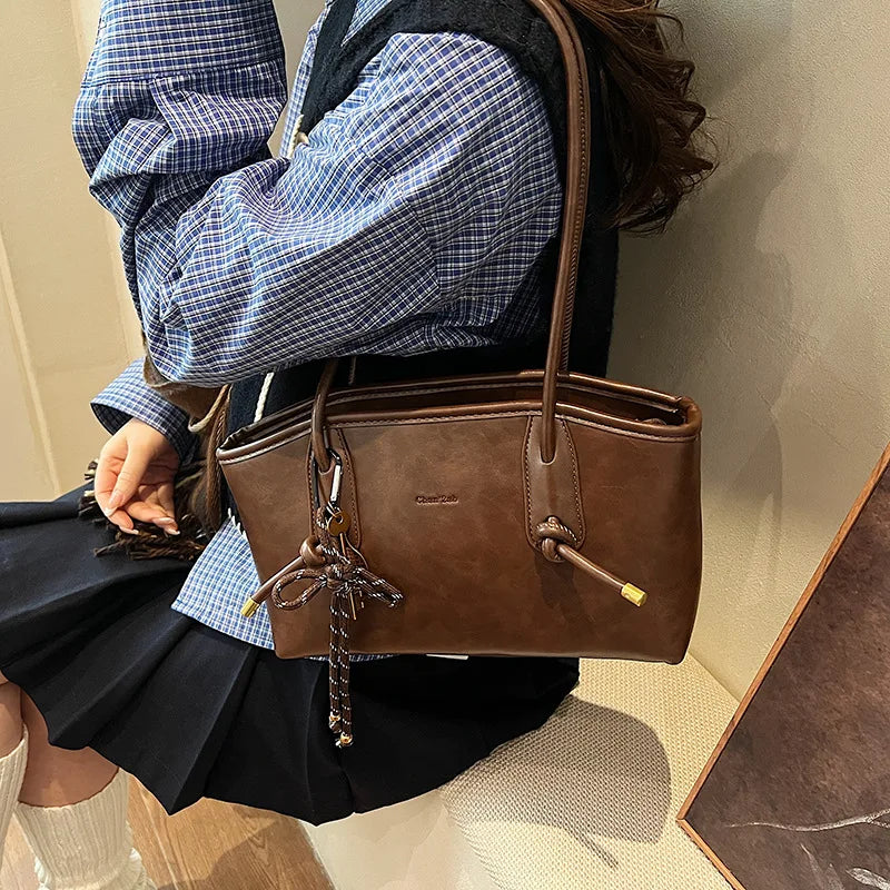 Bolsa Transversal Feminina em Couro Sintético