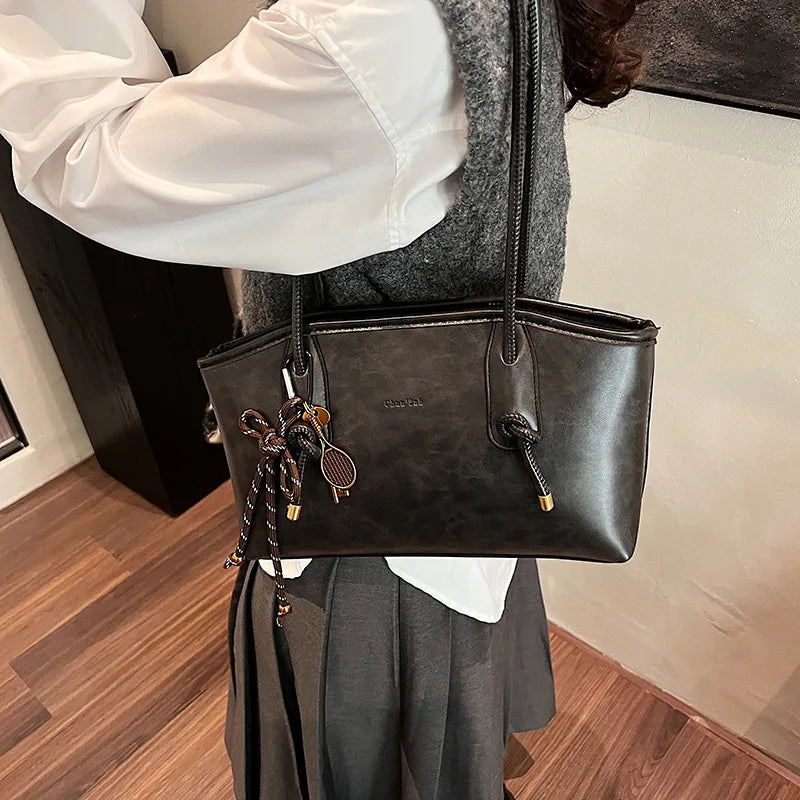 Bolsa Transversal Feminina em Couro Sintético